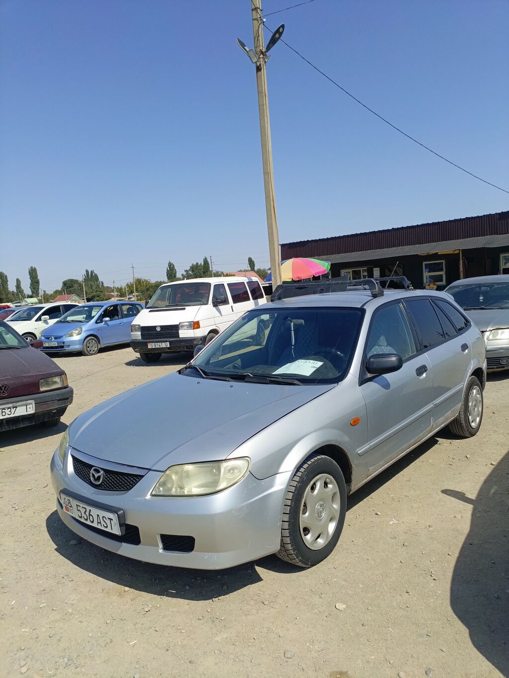Mazda 323: 2002 г., Механика, Бензин, Универсал: фото 3