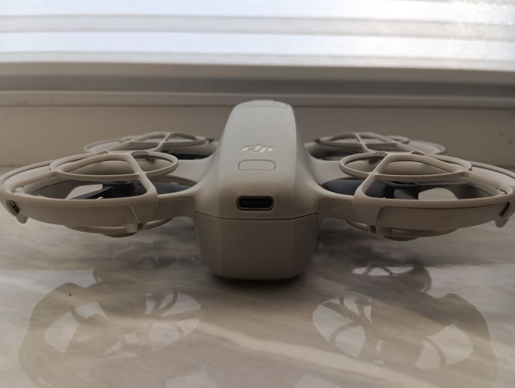 DJI Neo — компактный квадрокоптер с защитой винтов и камерой для ярких: фото 4