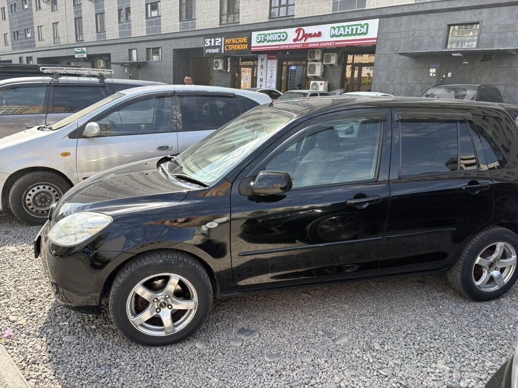Mazda Demio: 2005 г., 1.3 л, Автомат, Хэтчбэк: фото 5