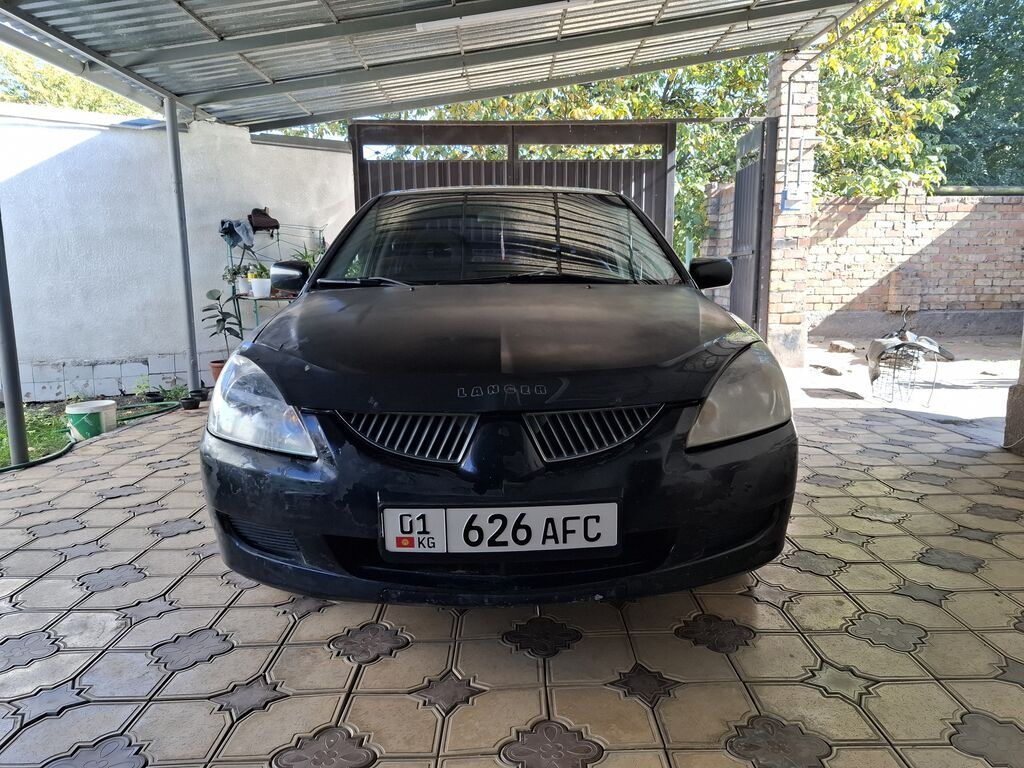Mitsubishi Lancer: 2005 г., 1.6 л, Автомат, Бензин, Седан: фото 1