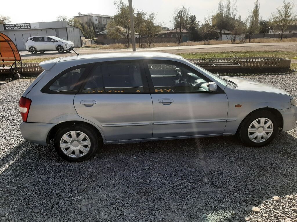 Mazda 323: 2002 г., 1.6 л, Автомат, Бензин, Хэтчбэк: фото 3