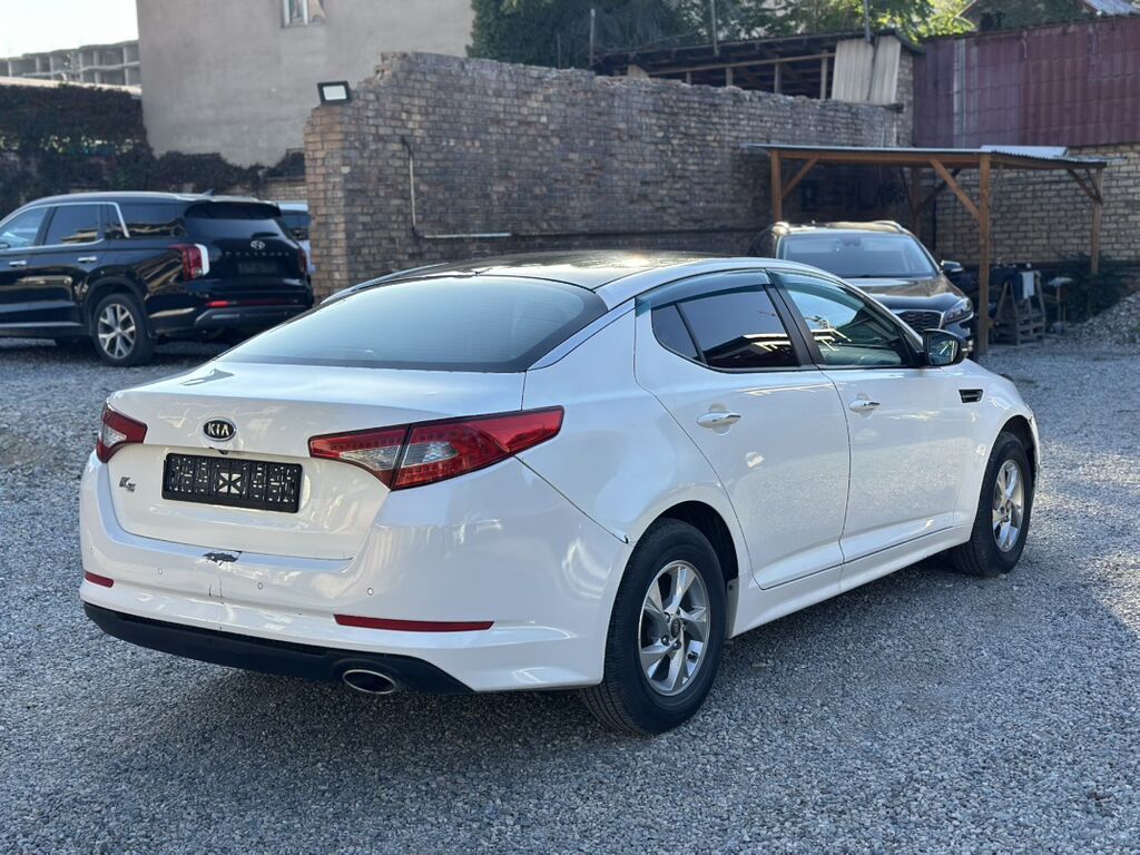 Kia Optima: 2010 г., 2 л, Бензин, Седан: фото 4