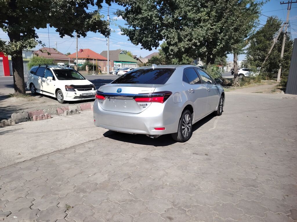 Toyota Corolla: 2019 г., 1.8 л, Вариатор, Гибрид, Седан: фото 4