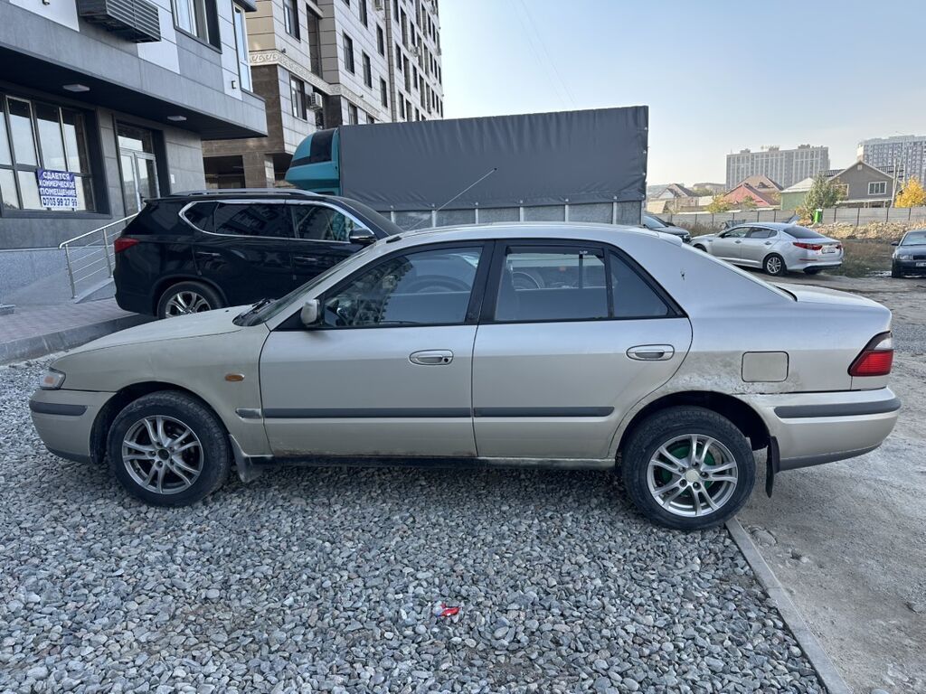 Mazda 626: 1998 г., 1.8 л, Механика, Бензин, Седан: фото 4