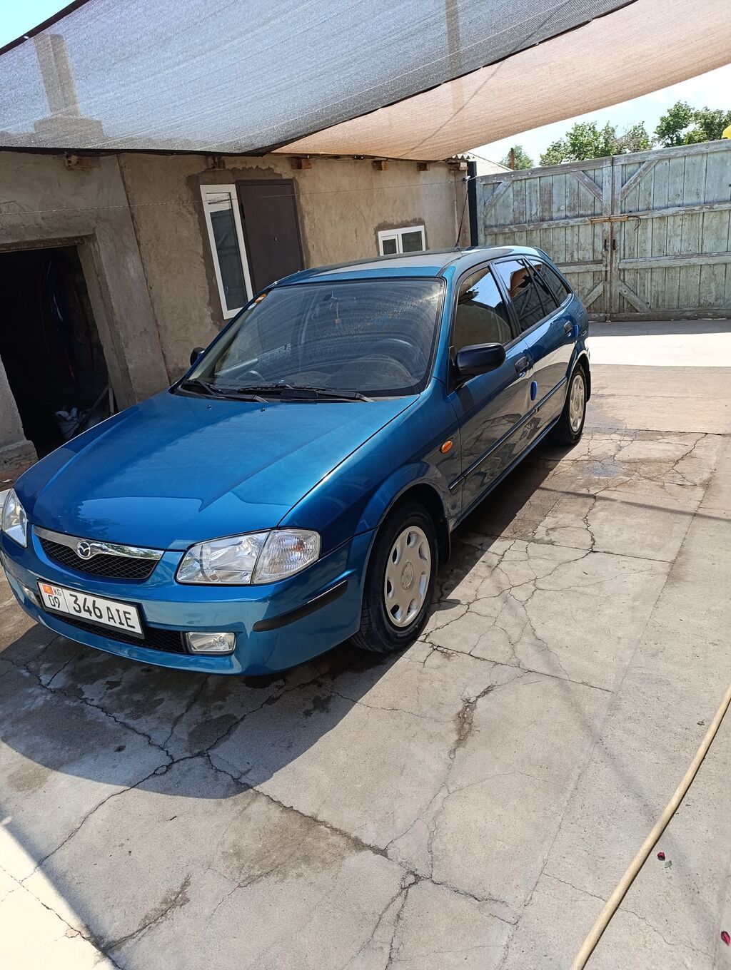 Mazda 323: 1999 г., 1.5 л, Автомат, Бензин, Универсал: фото 2