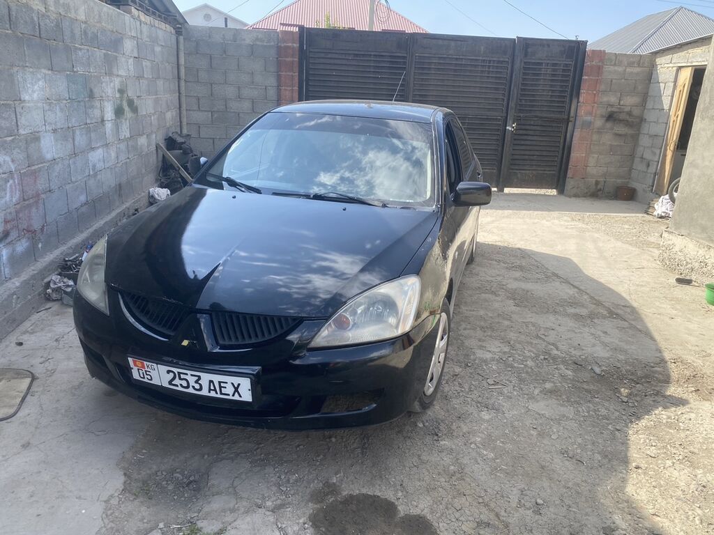 Mitsubishi Lancer: 2004 г., 1.6 л, Механика, Бензин, Седан: фото 2