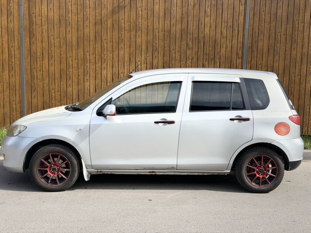 Mazda Demio: 2003 г., 1.3 л, Автомат, Бензин, Хэтчбэк: фото 8