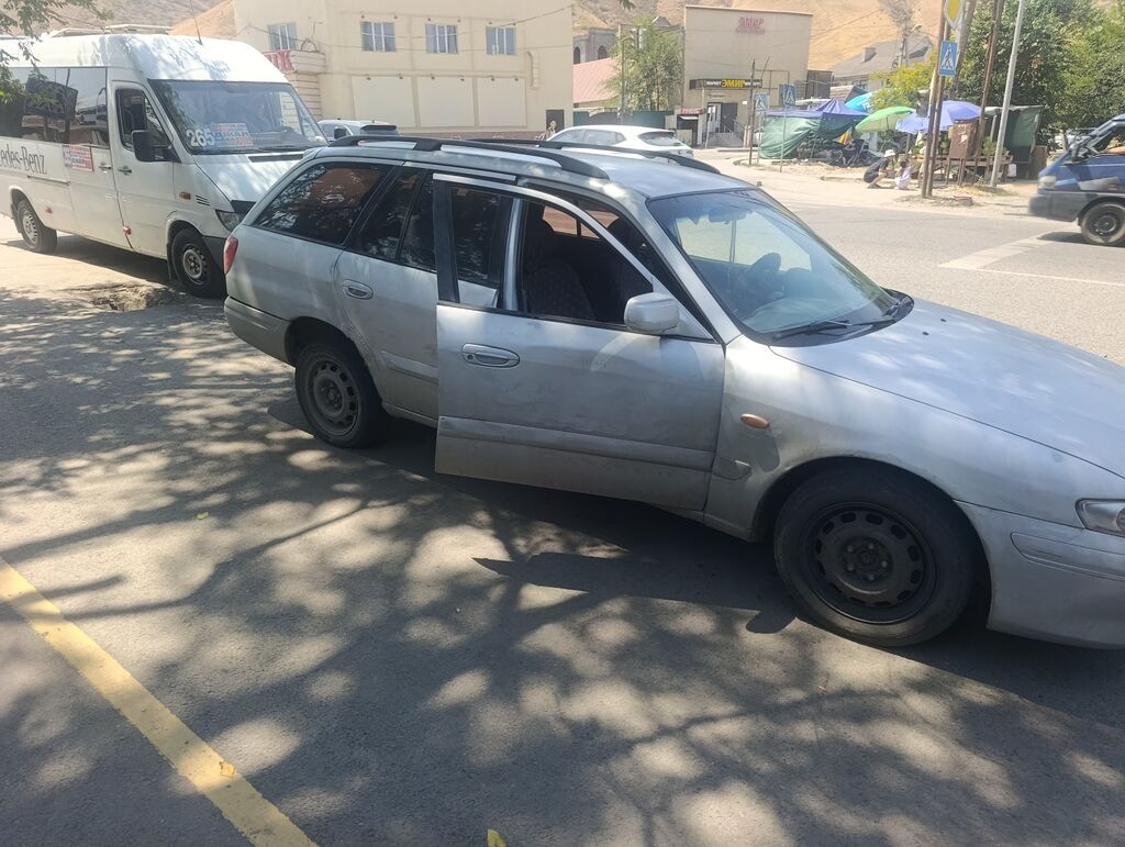 Mazda Capella 2001 г., универсал, 2.0 л, механика: фото 5