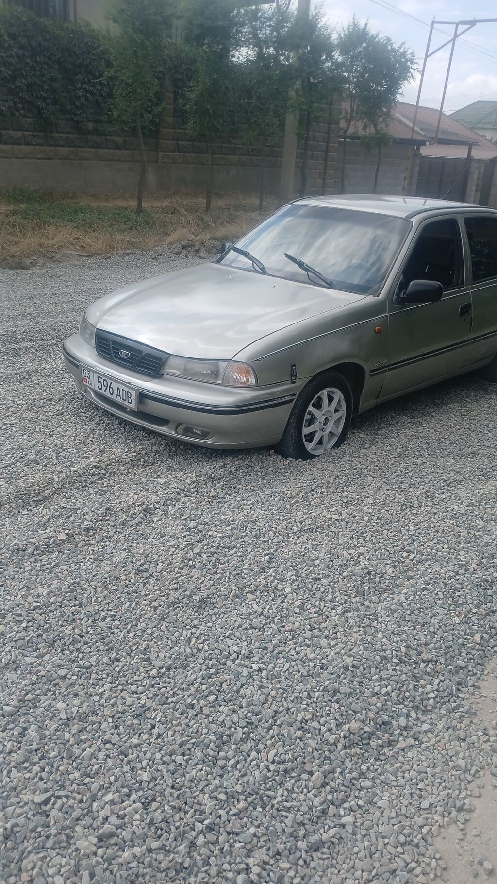 Daewoo Nexia: 2006 г., Механика, Седан: фото 2