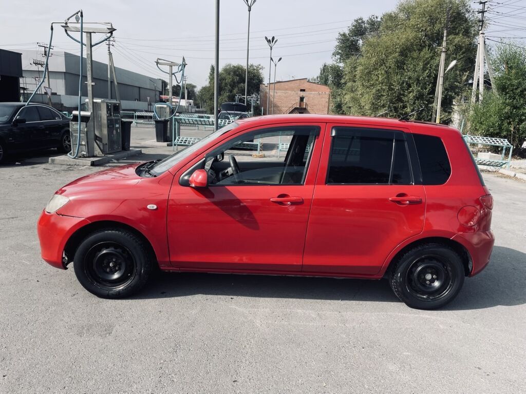 Mazda Demio: 2003 г., 1.5 л, Автомат, Газ, Хэтчбэк: фото 5