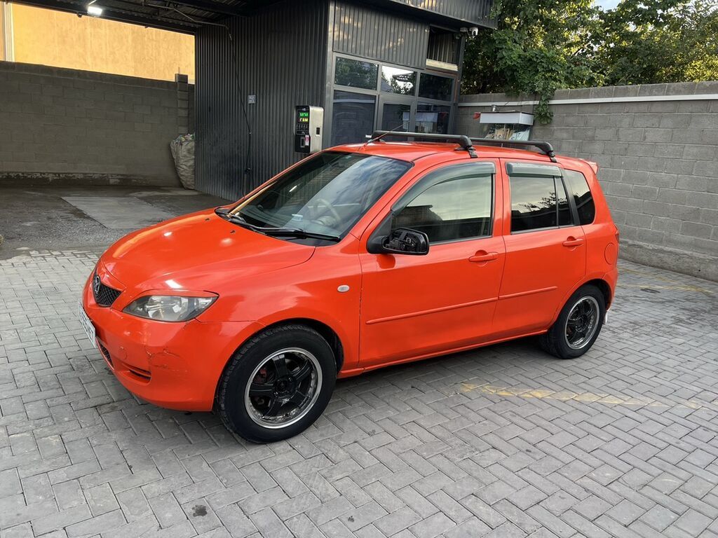 Mazda Demio: 2003 г., 1.3 л, Автомат, Бензин, Хэтчбэк — фото 5