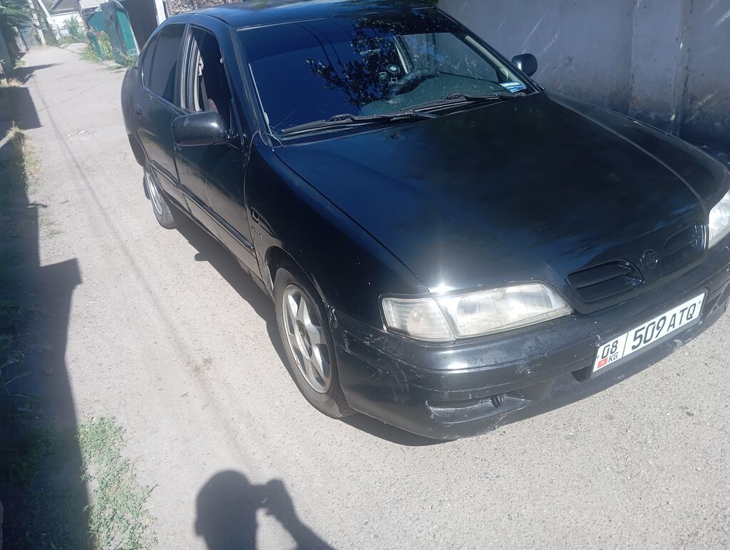Nissan Primera: 1996 г., 2 л, Механика, Бензин, Седан: фото 4