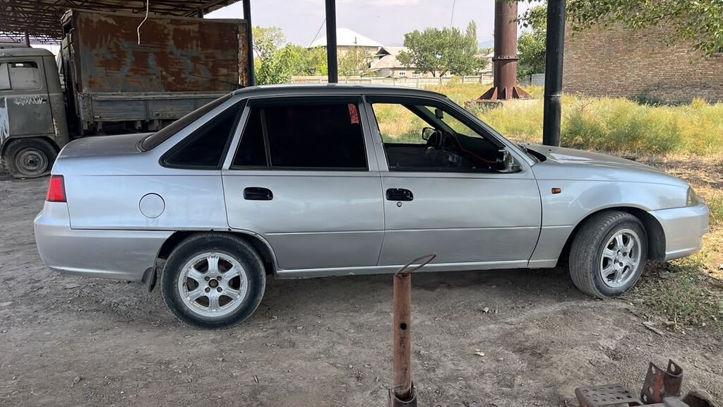 Daewoo Nexia: 2011 г., 1.5 л, Механика, Бензин, Седан: фото 2