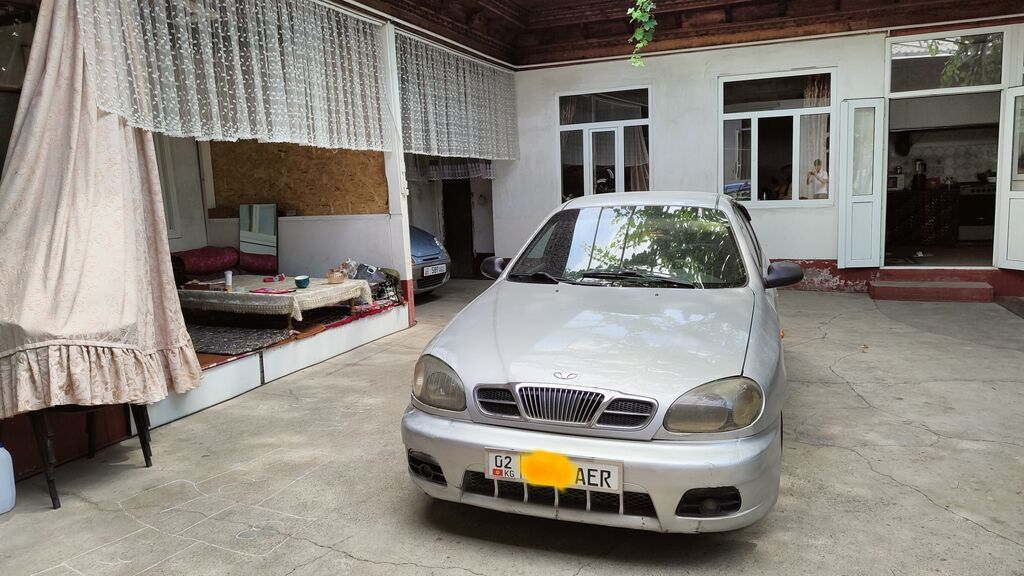 Daewoo Lanos: 2001 г., 1.5 л, Автомат, Газ, Седан — фото 4