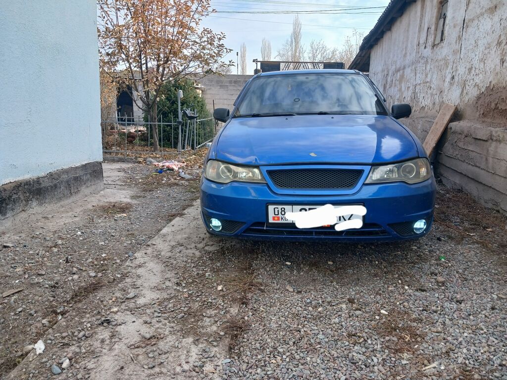 Седан синего цвета с доработанным внешним видом. Основные — фото 2