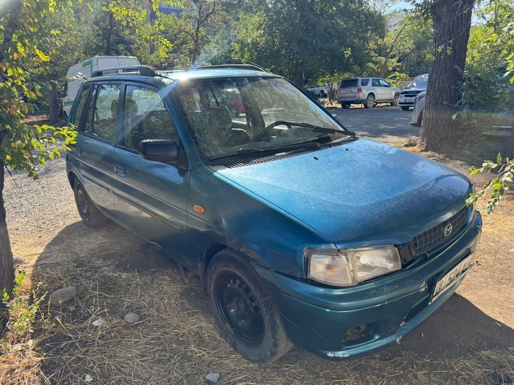 Mazda Demio: 1999 г., 1.6 л, Механика, Бензин, Хэтчбэк: фото 2