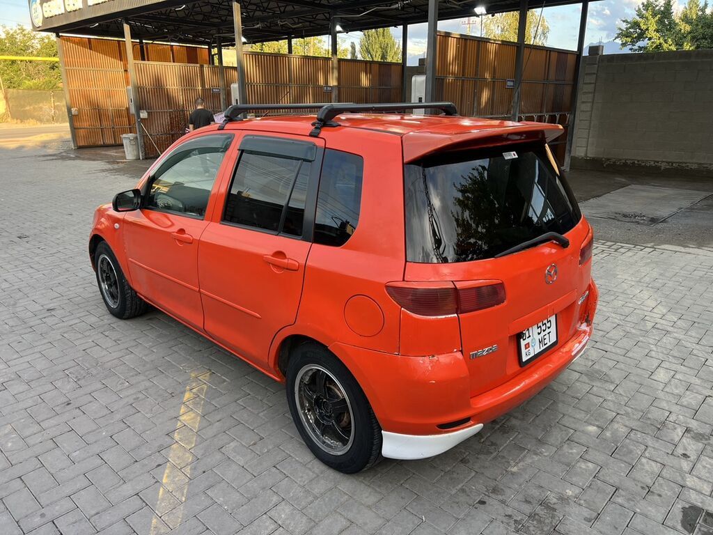 Mazda Demio: 2003 г., 1.3 л, Автомат, Бензин, Хэтчбэк — фото 4