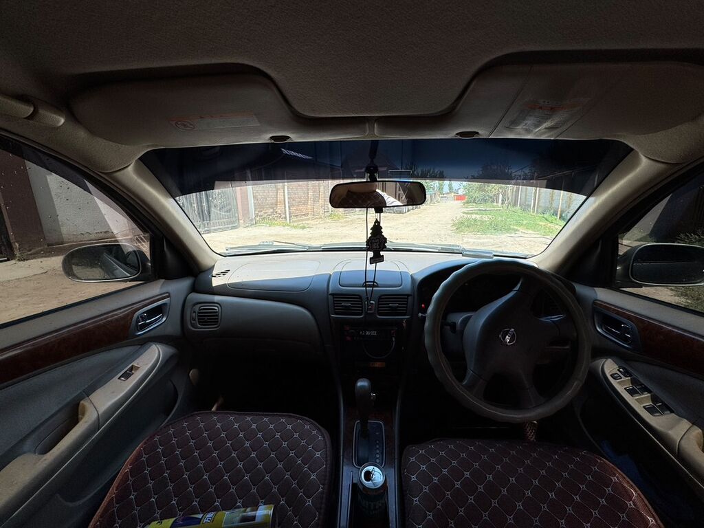 Nissan Bluebird: 2003 г., 1.5 л, Автомат, Бензин, Седан: фото 7