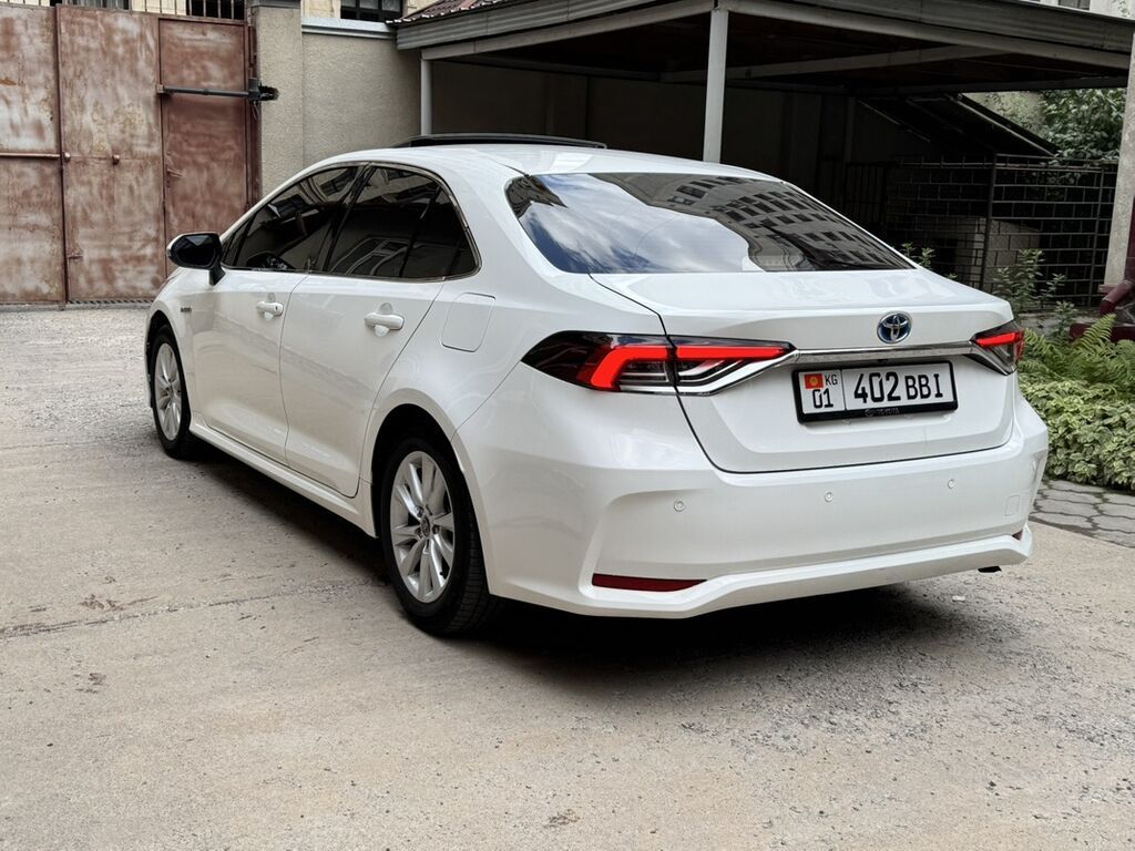 Toyota Corolla: 2023 г., 1.8 л, Вариатор, Гибрид, Седан: фото 5