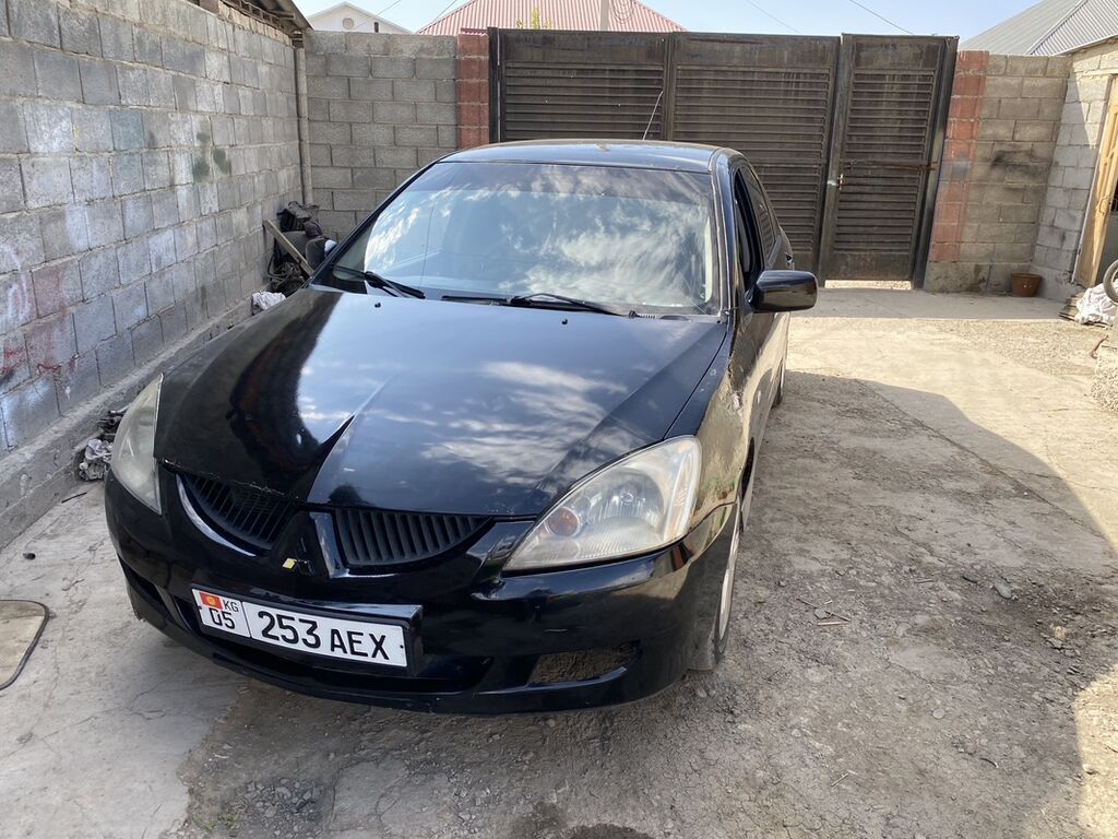 Mitsubishi Lancer: 2004 г., 1.6 л, Механика, Бензин, Седан: фото 3