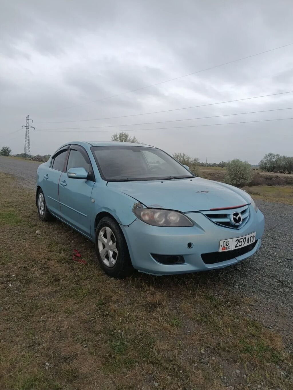 Mazda 3: 2006 г., 1.5 л, Автомат, Бензин, Седан: фото 2