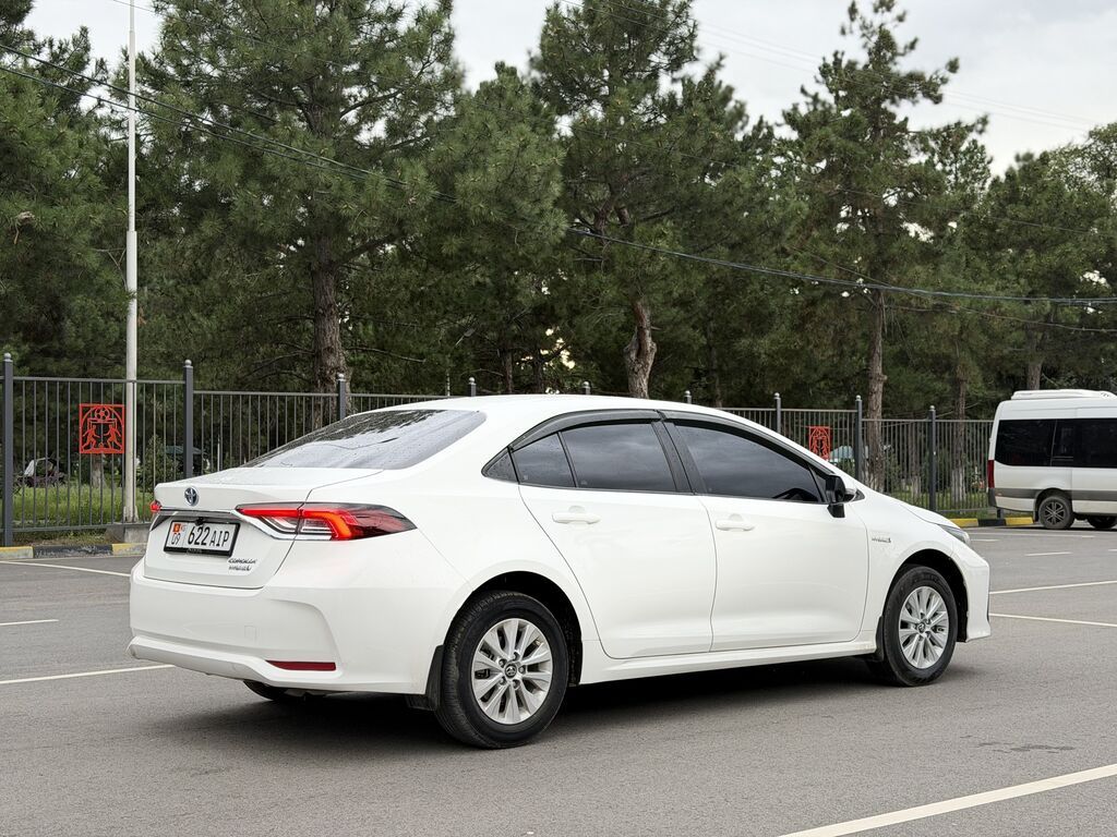 Toyota Corolla: 2021 г., 1.8 л, Автомат, Гибрид, Седан: фото 5