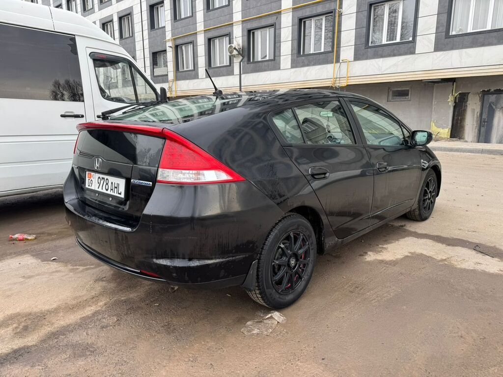 Honda Insight: 2010 г., 1.3 л, Вариатор, Гибрид, Хэтчбэк: фото 7