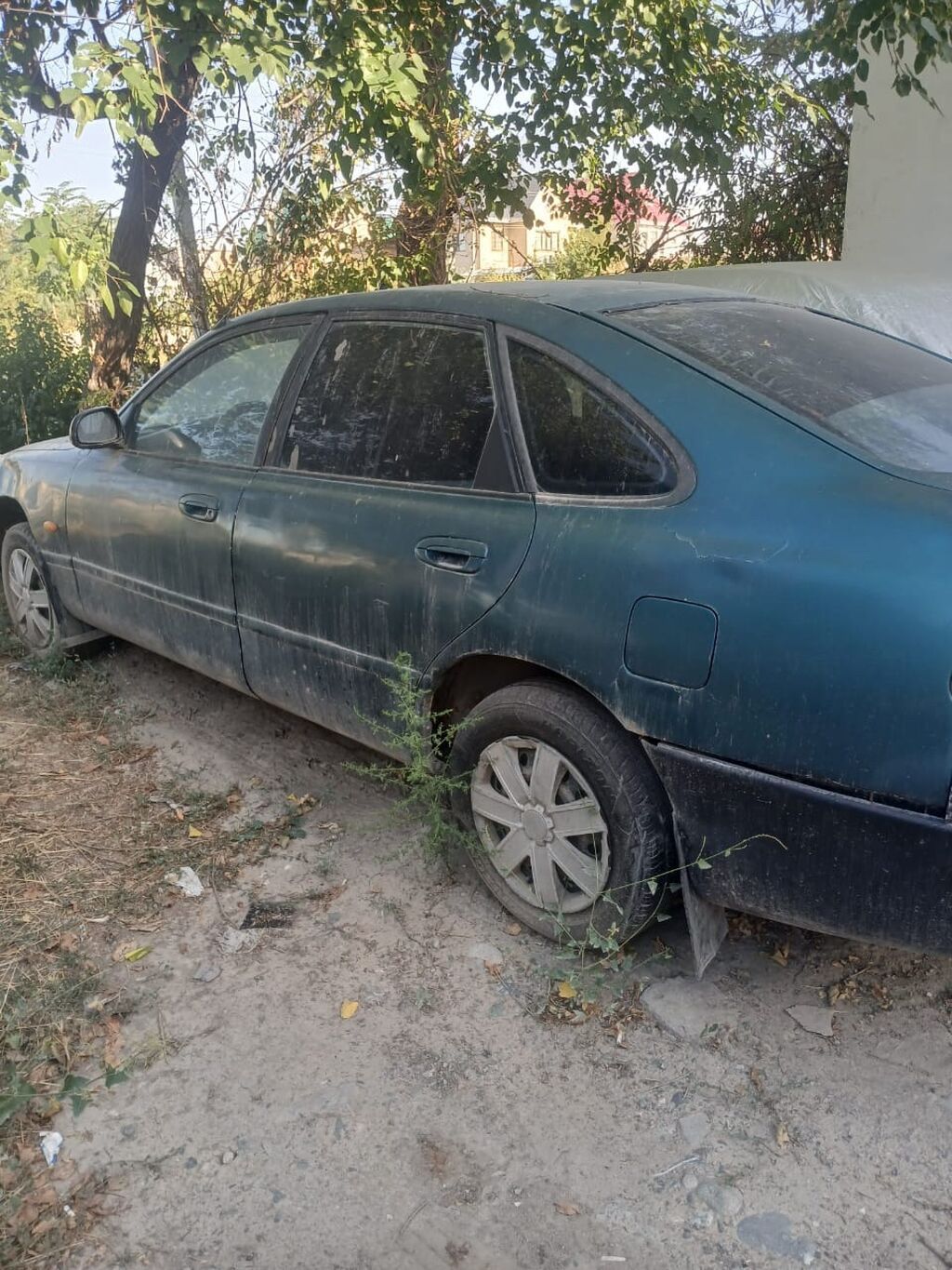 Mazda Cronos: 1992 г., 1.8 л, Механика, Бензин, Хэтчбэк: фото 3