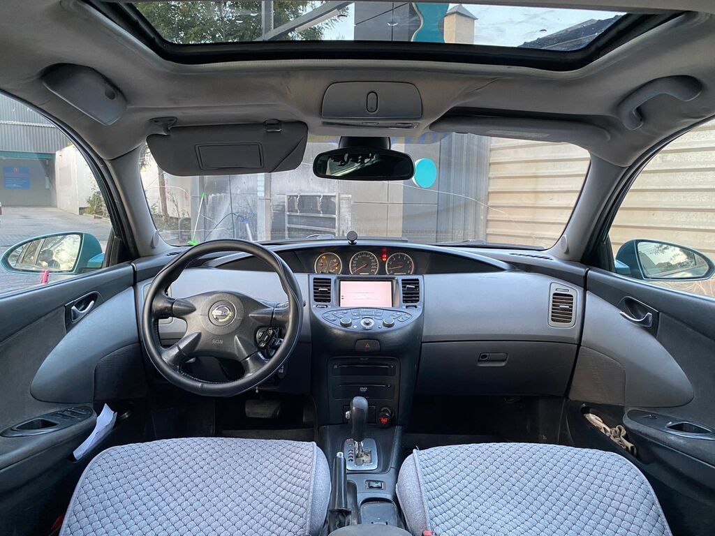Nissan Primera: 2002 г., 2 л, Вариатор, Газ, Универсал: фото 8
