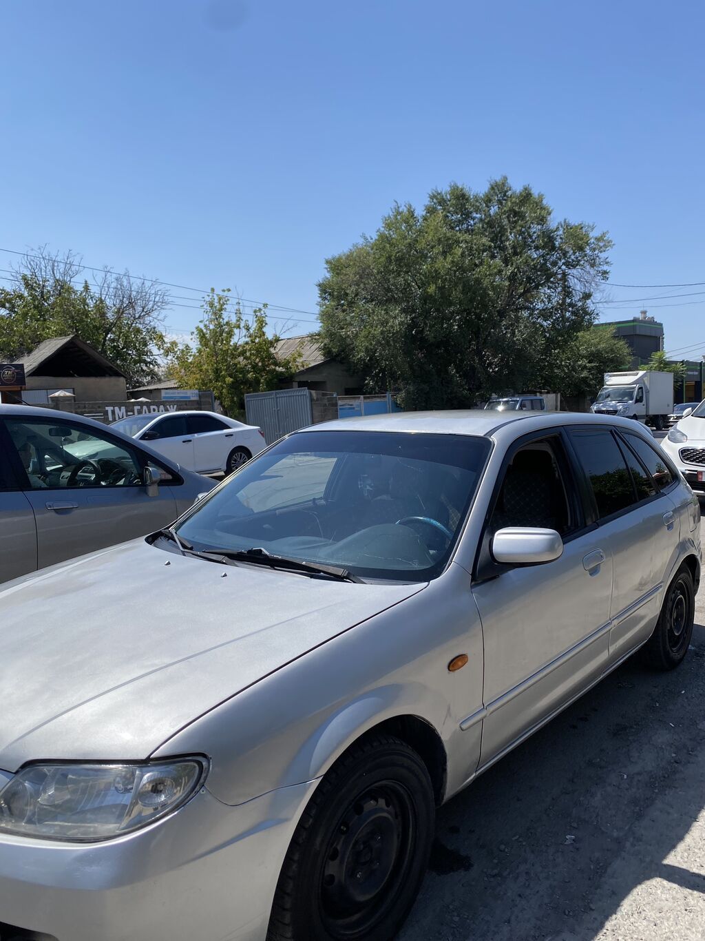 Mazda 323: 2002 г., Механика, Бензин, Хэтчбэк: фото 5