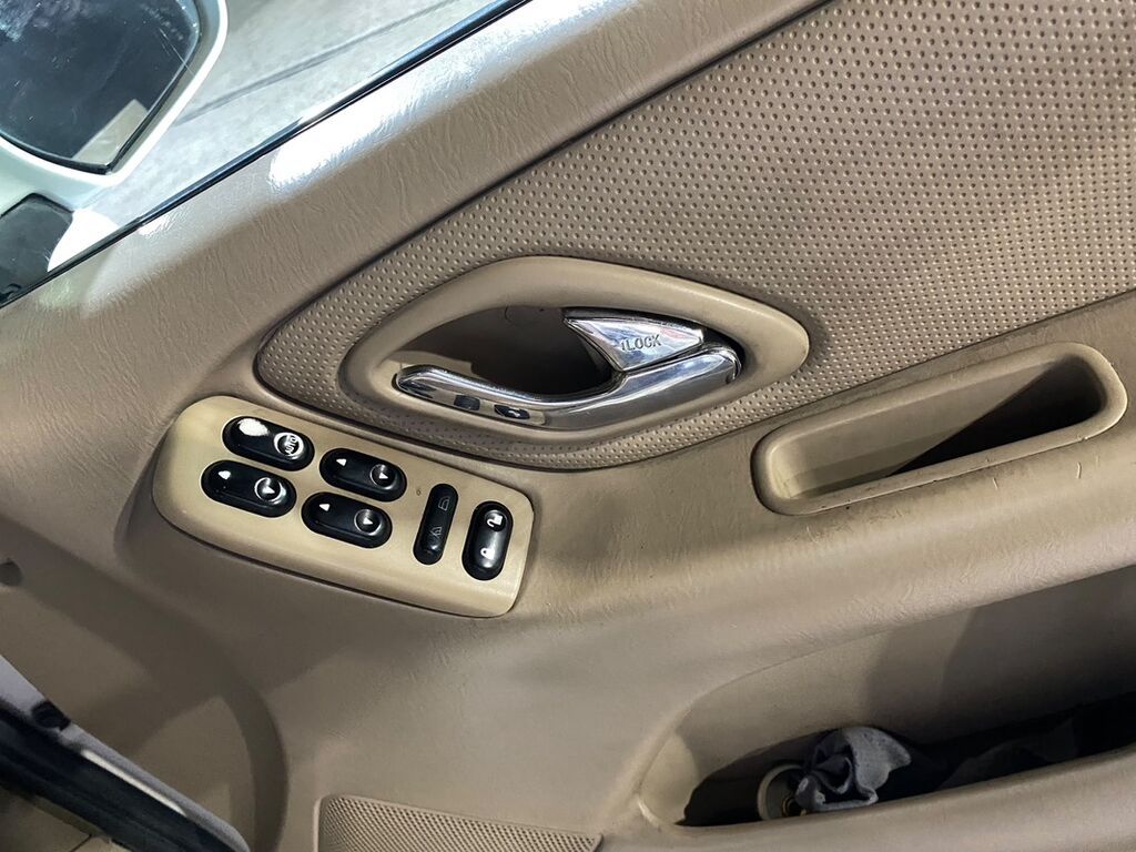 Mazda Tribute: 2001 г., 2 л, Автомат, Газ, Кроссовер: фото 7