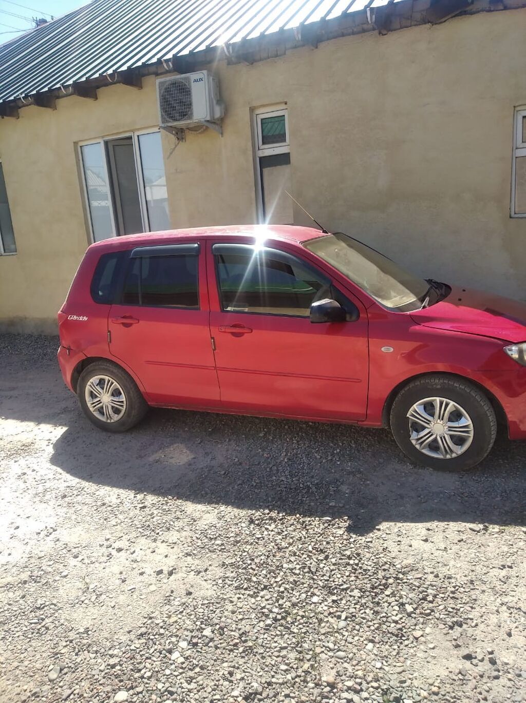 Mazda Demio: 2003 г., 1.3 л, Автомат, Бензин: фото 2