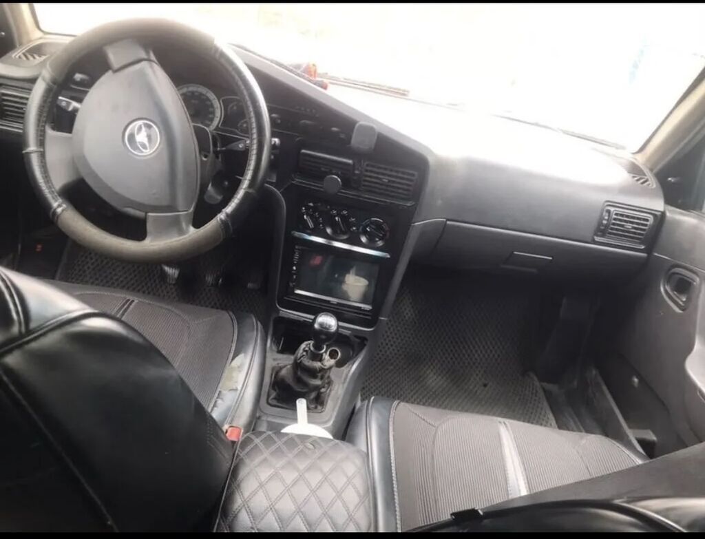 Daewoo Nexia 2010, 1.6 л, механика, седан: фото 3