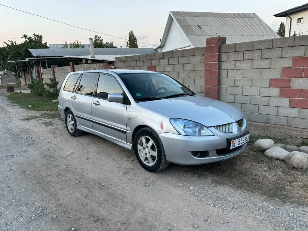 Mitsubishi Lancer: 2003 г., 1.6 л, Механика, Бензин, Универсал: фото 4
