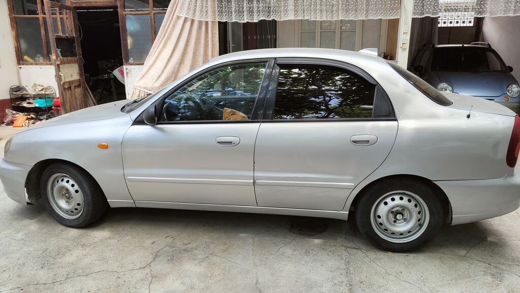 Daewoo Lanos: 2001 г., 1.5 л, Автомат, Газ, Седан: фото 7