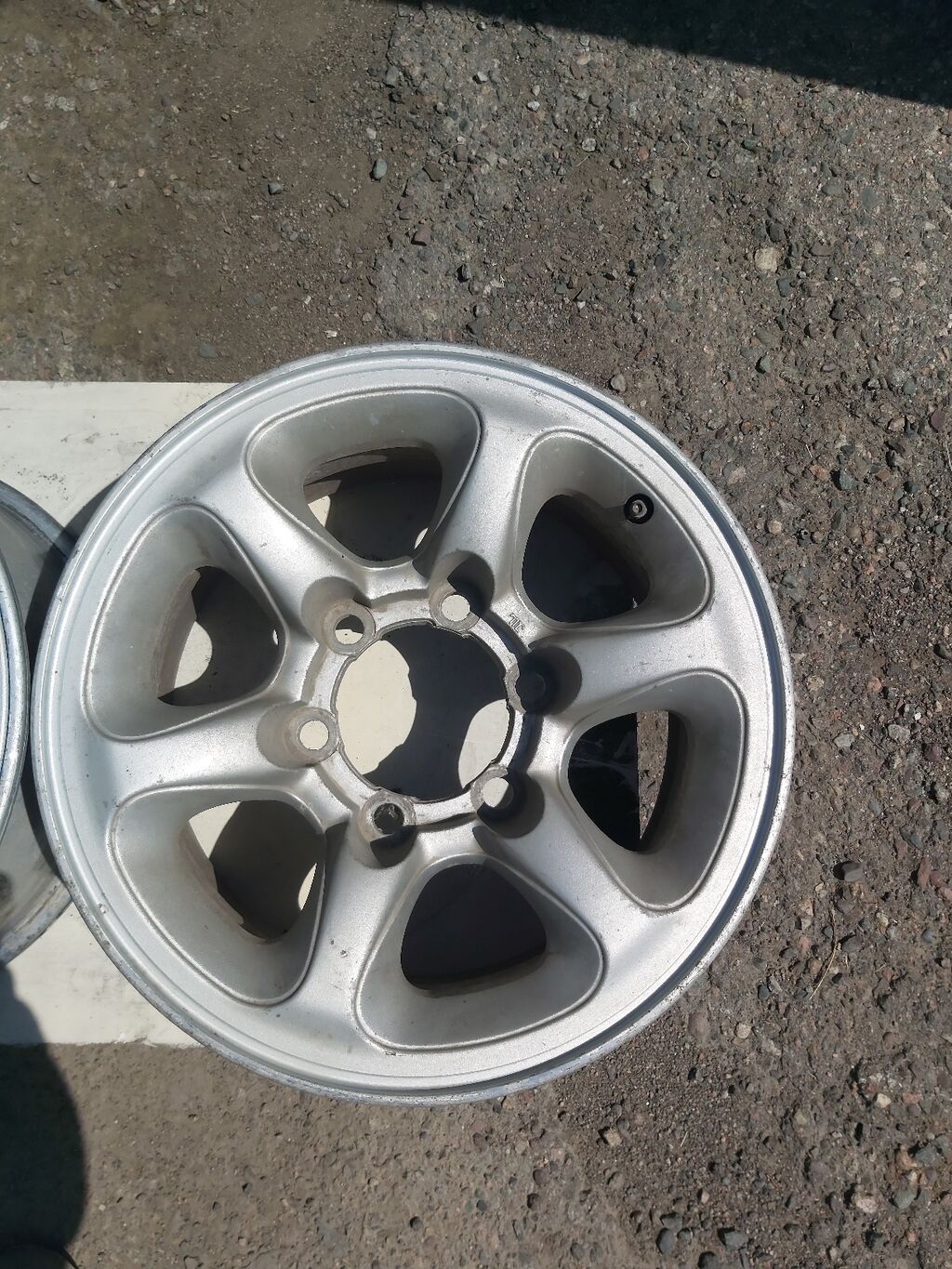 Литые диски R15, комплект из 4 шт. МИТСУБИСИ ДЕЛИКА. Оригинал в: фото 1