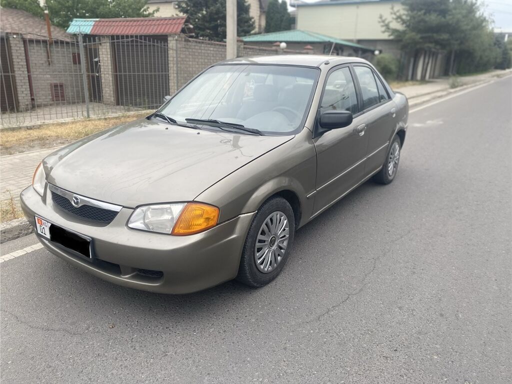 Mazda Protege: 2000 г., 1.6 л, Автомат, Бензин, Седан: фото 2