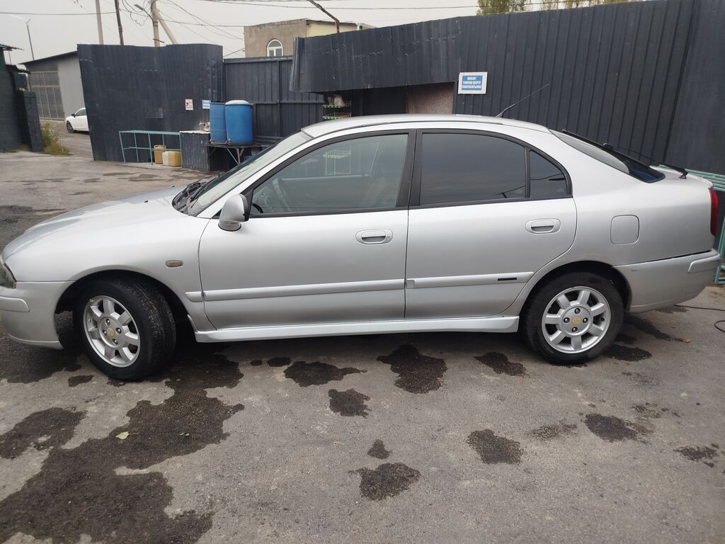 Mitsubishi Carisma: 2004 г., 1.6 л, Механика, Бензин, Лифтбек: фото 8