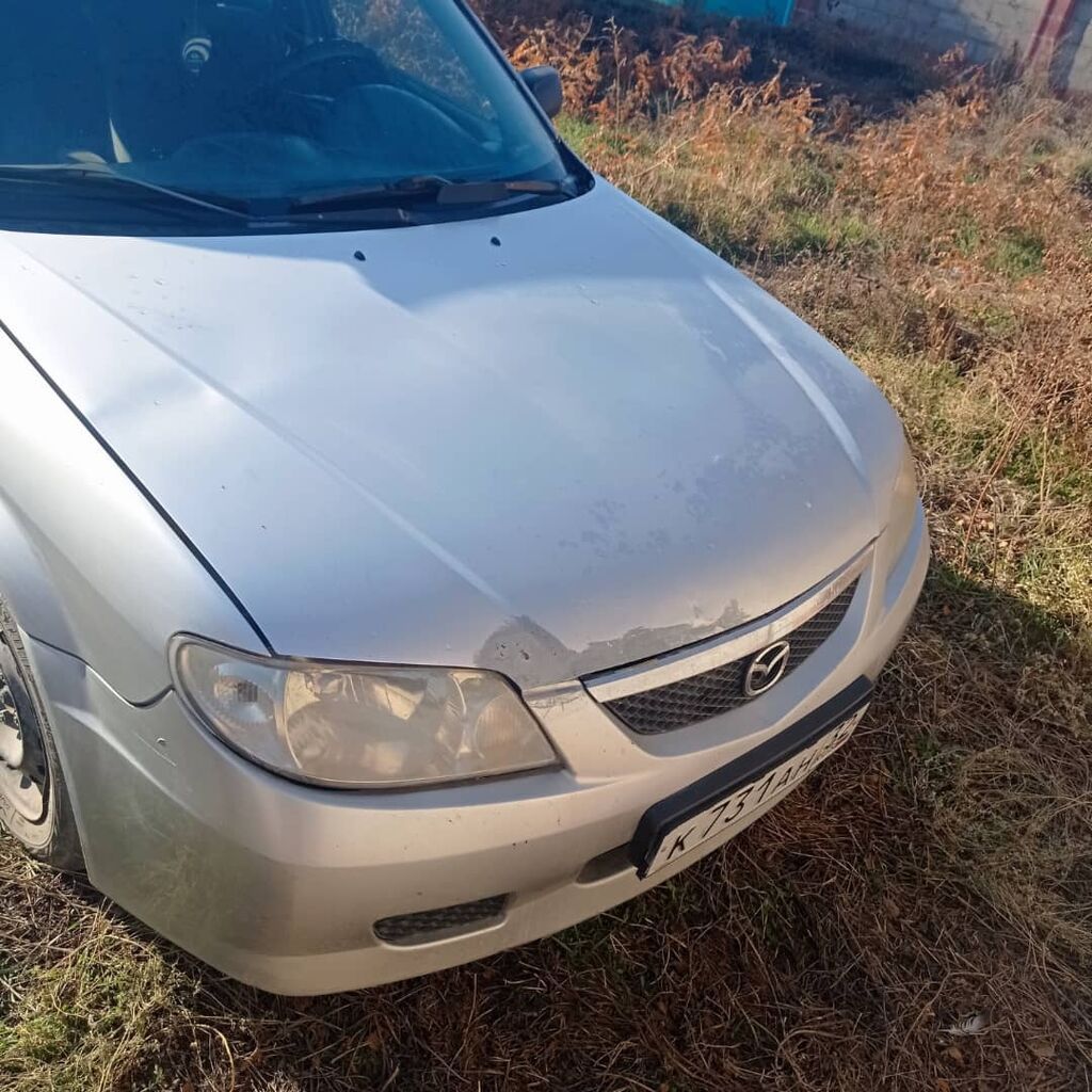 Mazda 323: 2000 г., 1.6 л, Механика, Бензин, Универсал: фото 7