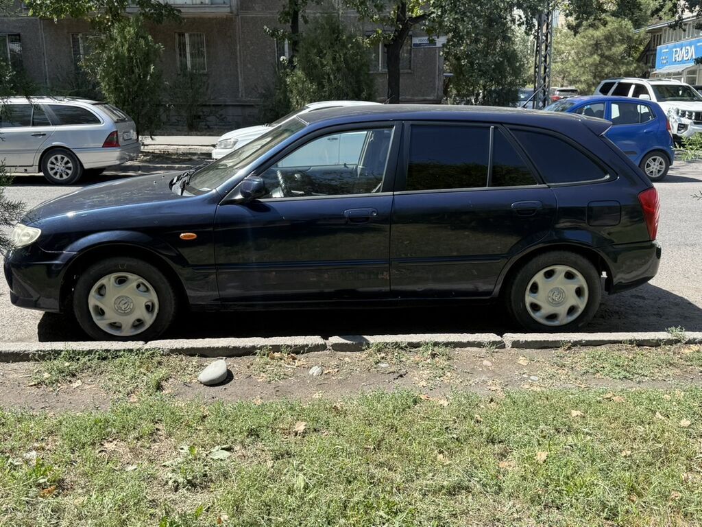 Mazda 323: 2002 г., 1.6 л, Механика, Бензин, Хэтчбэк: фото 3