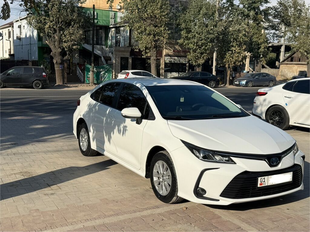 Toyota Corolla: 2019 г., 1.8 л, Вариатор, Гибрид, Седан: фото 7