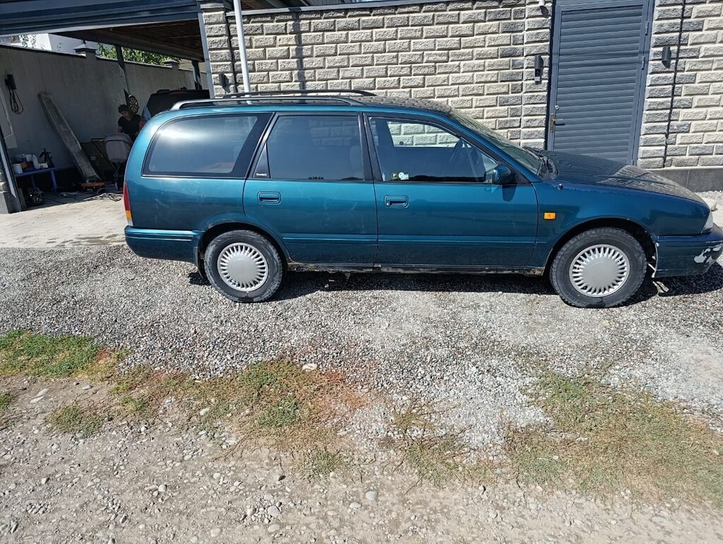 Nissan Primera: 1997 г., 1.6 л, Механика, Универсал: фото 3