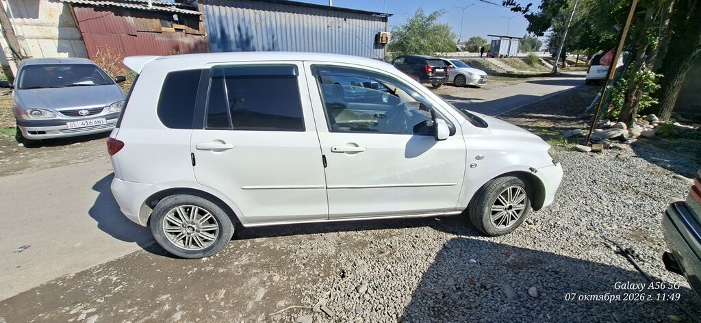 Mazda Demio: 2004 г., 1.5 л, Автомат, Бензин, Хэтчбэк: фото 5