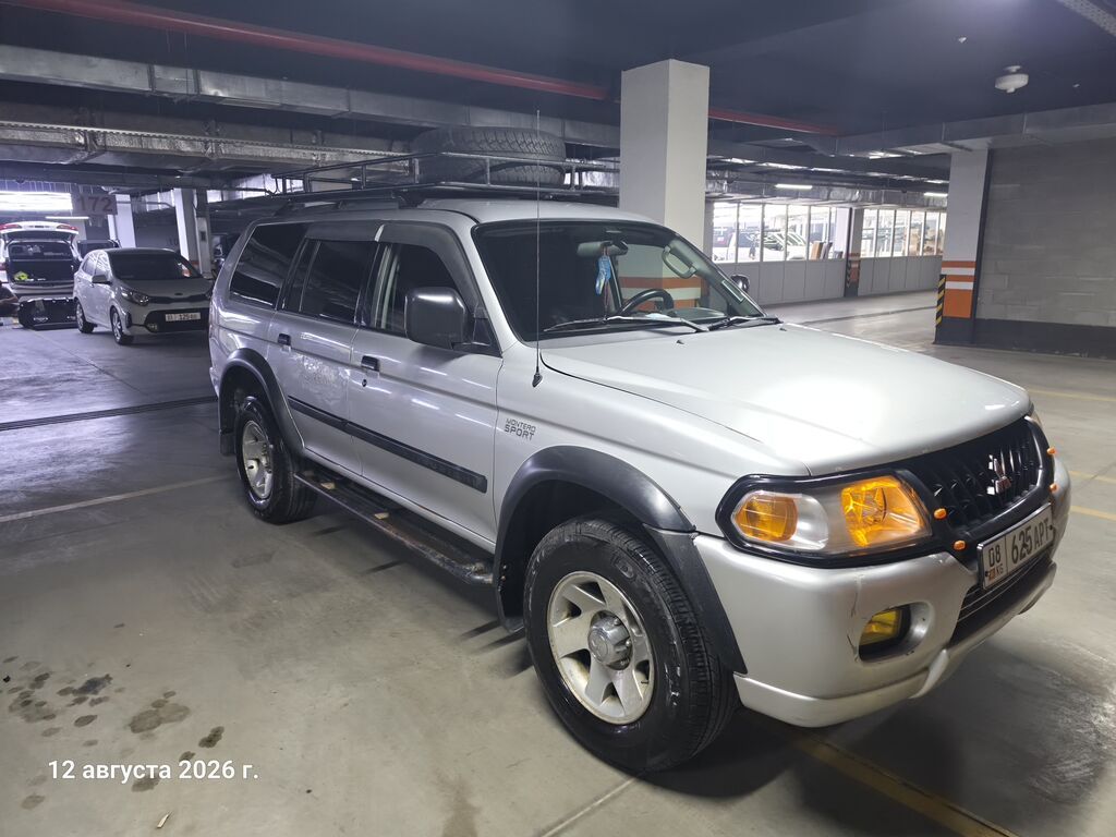 Mitsubishi Pajero Sport: 2003 г., 3 л, Автомат, Газ, Внедорожник: фото 7