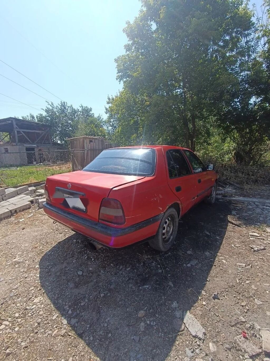 Nissan Sunny: 1991 г., 1.6 л, Механика, Бензин, Седан — фото 1