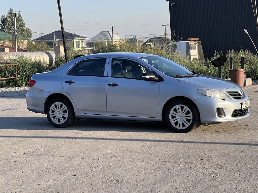 Toyota Corolla: 2011 г., 1.3 л, Механика, Бензин, Седан: фото 7