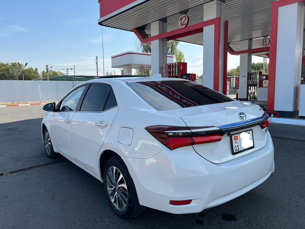 Toyota Corolla: 2019 г., 1.8 л, Вариатор, Гибрид, Седан: фото 5