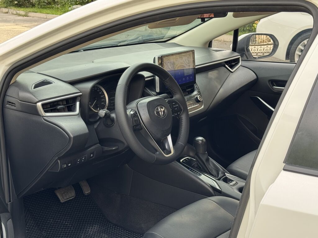 Toyota Corolla: 2019 г., 1.8 л, Вариатор, Гибрид, Седан: фото 7