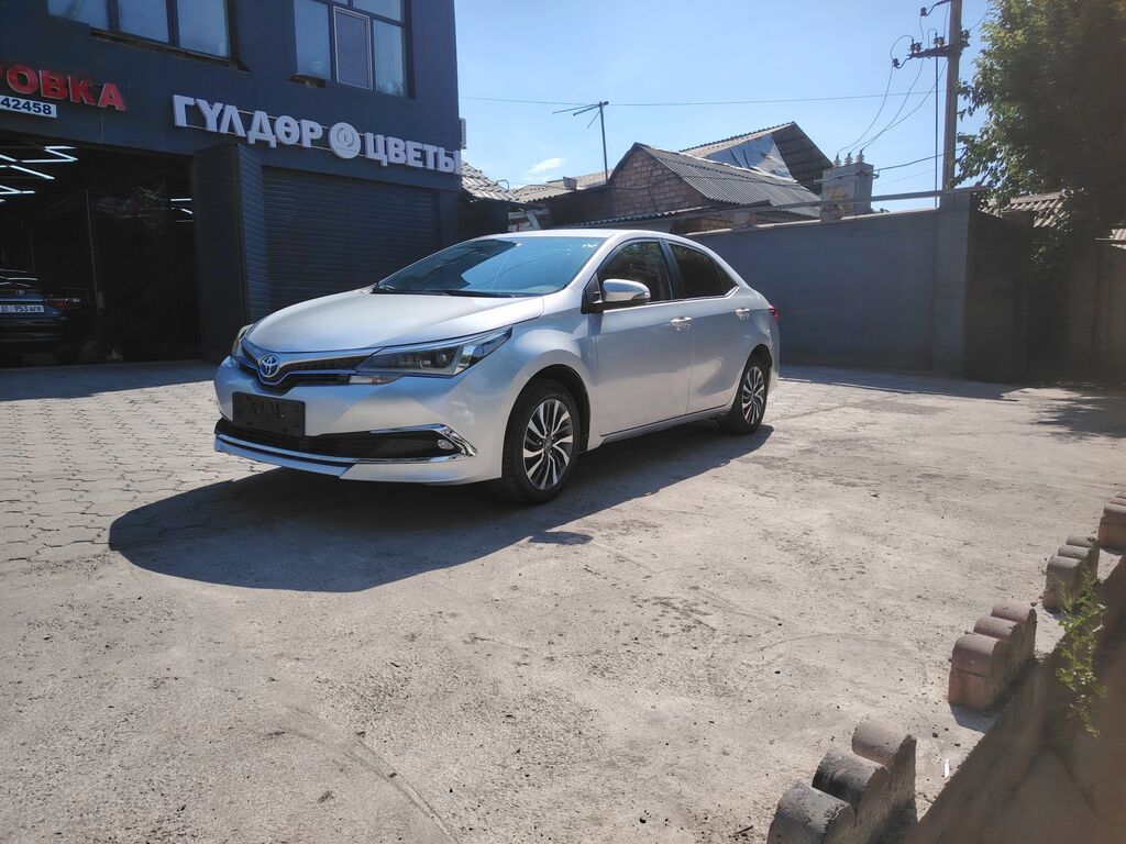 Toyota Corolla: 2019 г., 1.8 л, Вариатор, Гибрид, Седан: фото 2