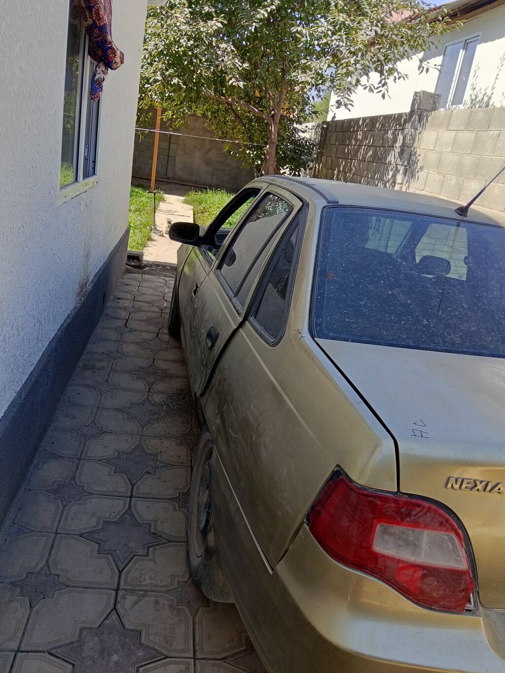 Daewoo Nexia: 2010 г., Механика, Седан: фото 4
